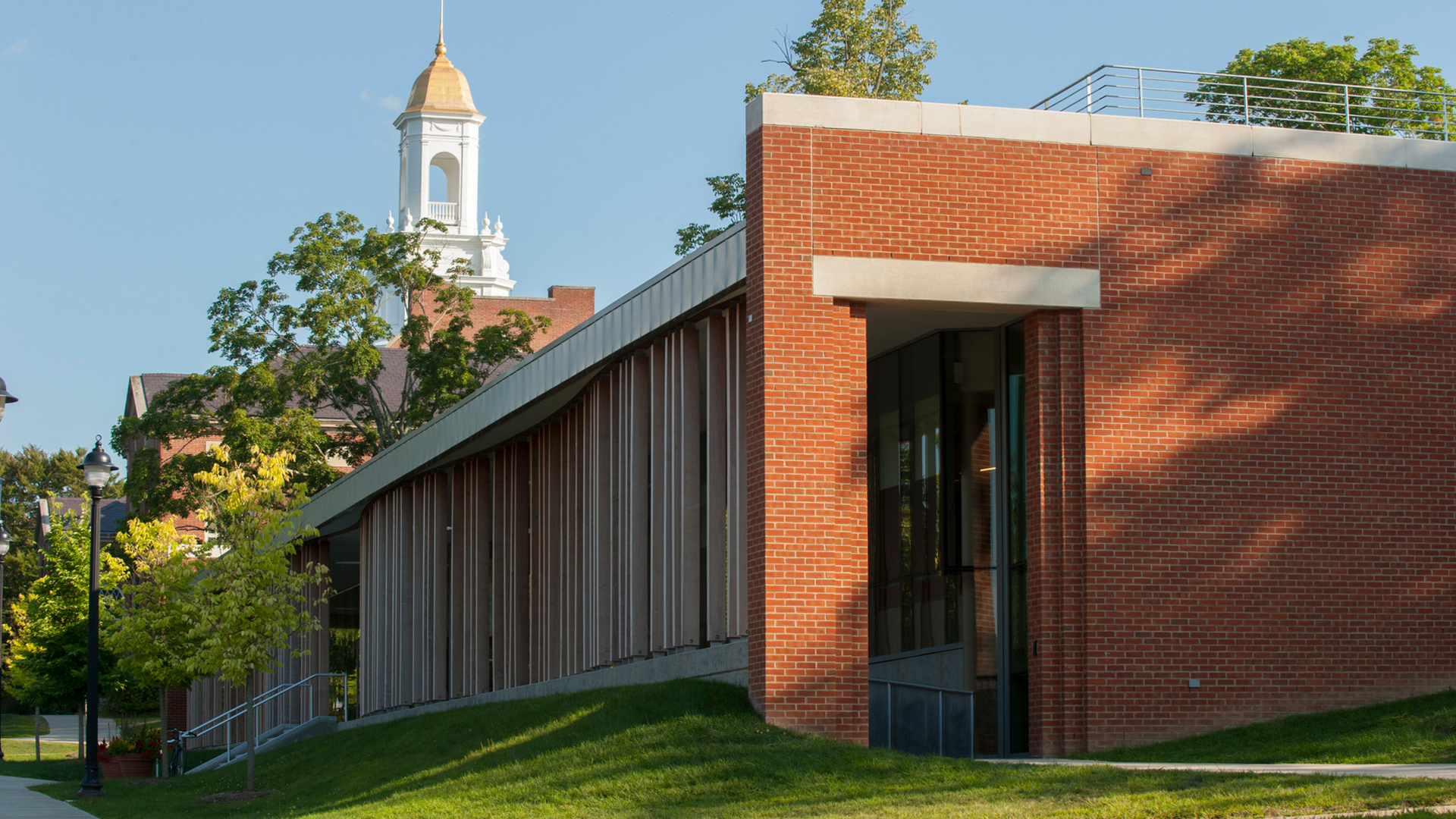 Storrs Hall during the day with Wilbur Cross in the background
